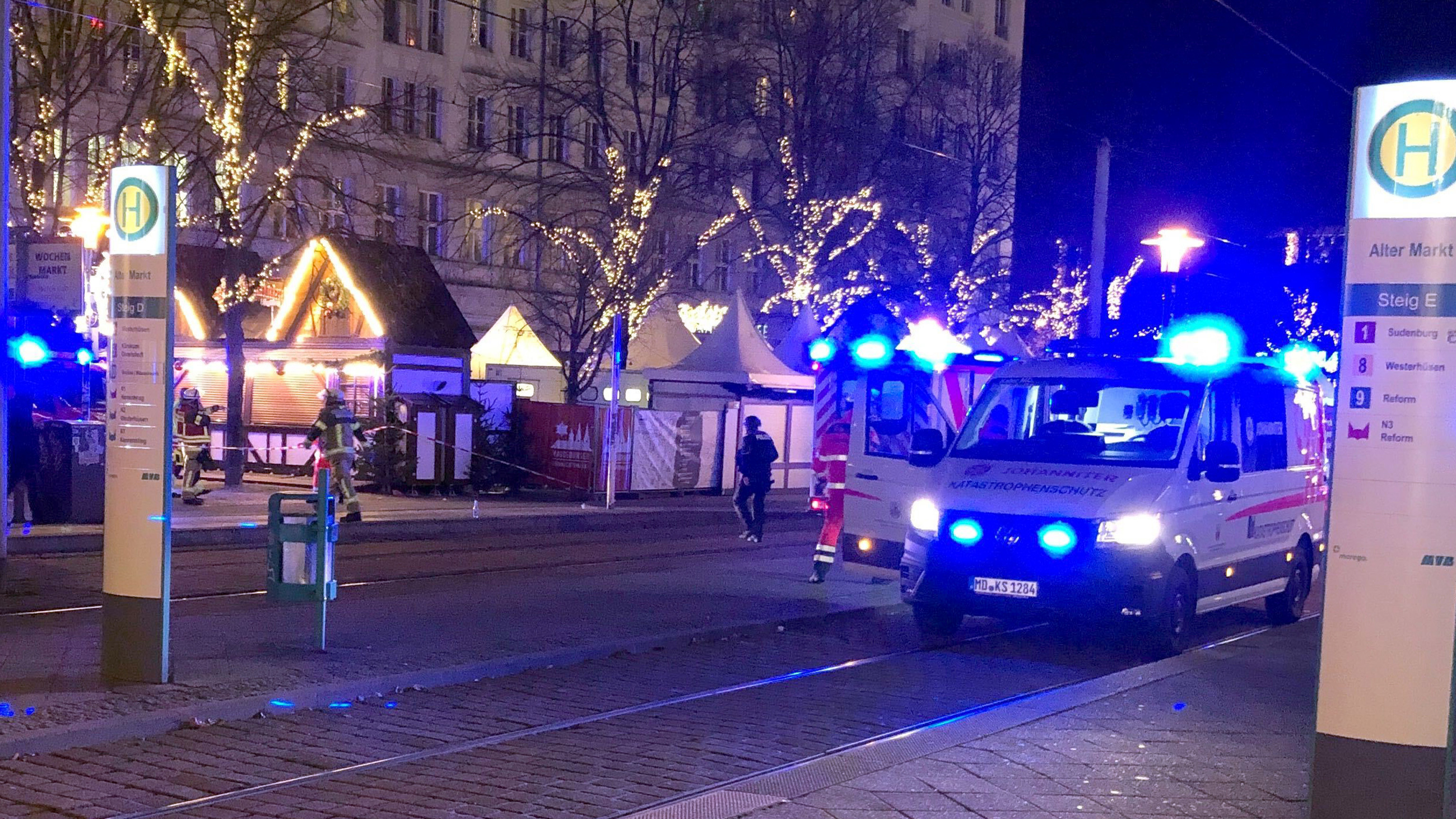 20 December 2024, Saxony-Anhalt, Magdeburg: Rescue workers in action at the Christmas market in Magdeburg.